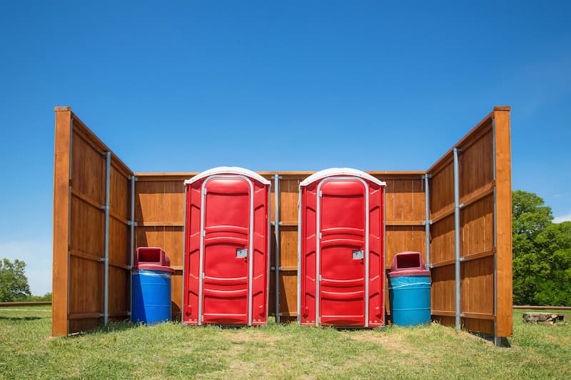 Short-term porta potty units staged for delivery in Eagle Pass, Texas